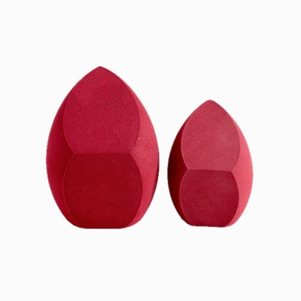 Slanted irregularly shaped makeup sponge