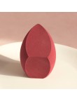 Slanted irregularly shaped makeup sponge