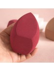 Slanted irregularly shaped makeup sponge