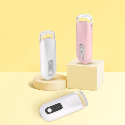 Electric heated eyelash curler with comb