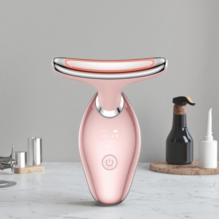Handheld facial and neck lifting beauty device