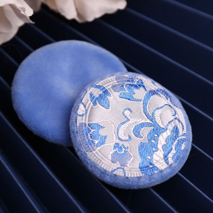 Soft makeup powder puff with embroidered pattern